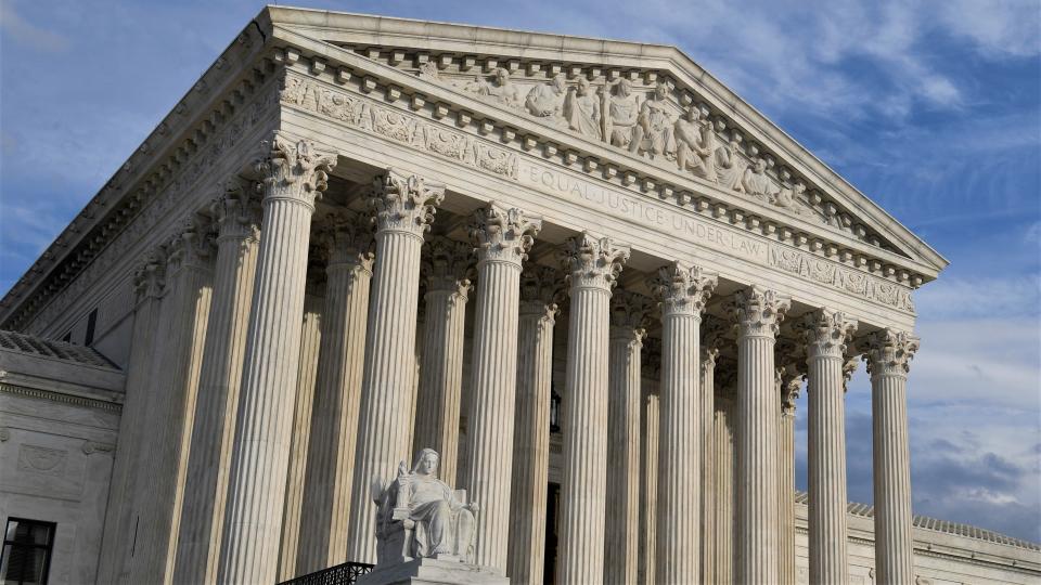 This is a March 15 view of the Supreme Court in Washington. The Supreme Court seems inclined to rule against workers on oil drilling platforms off California who want to be paid for the off-work time they spend on the platform, including sleeping.