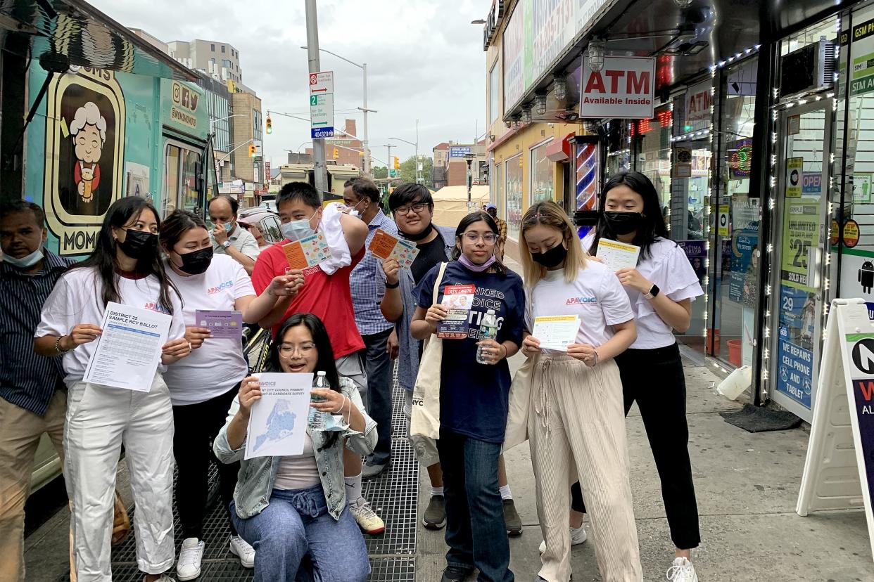 Get-out-the-vote initiatives in predominantly Asian American neighborhoods are not only aimed at registering people to vote but also teaching them about ranked-choice voting. (MinKwon Center for Community Action / APA)