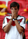 <p>Germany fan looks dejected after the match as they go out of the World Cup. REUTERS/John Sibley </p>