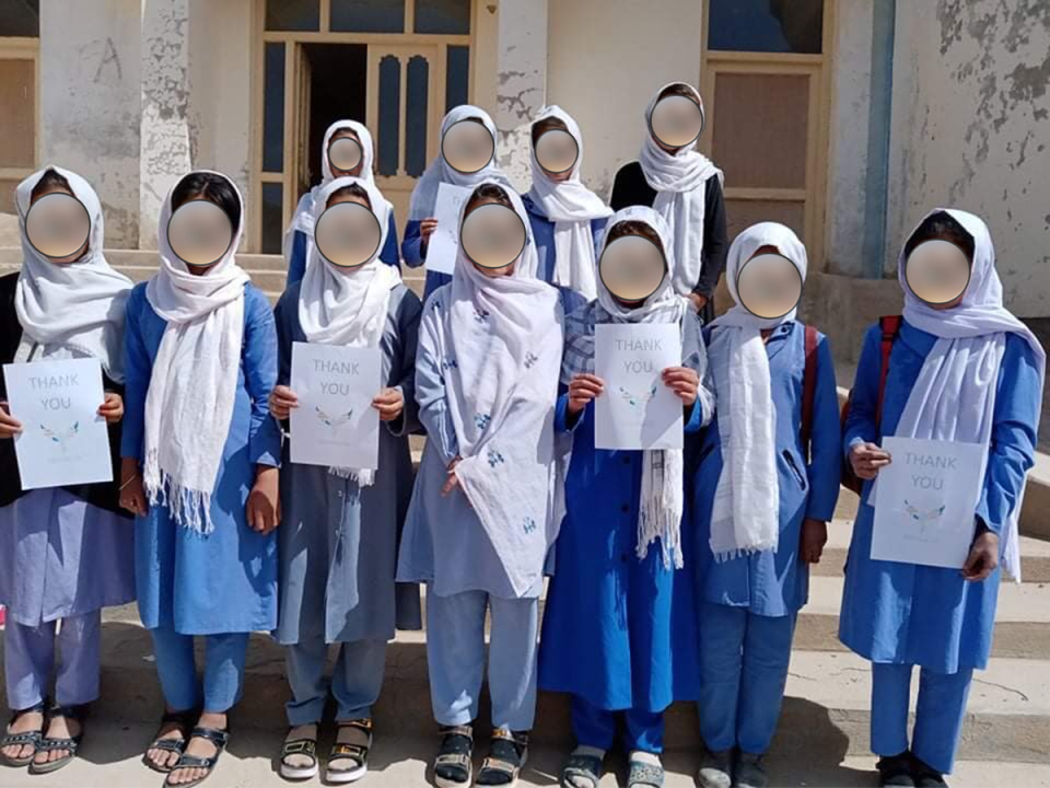 Girls being supported through Buddy Box in Afghanistan. Faces have been blurred to protect their identity (Medhi Nazari/PA)