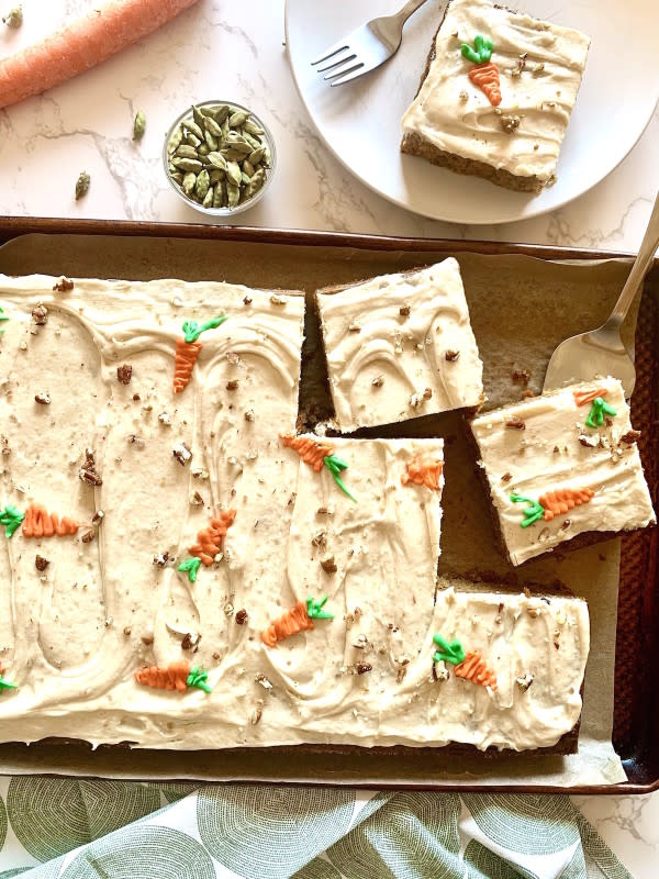 <p>Big Delicious Life</p><p>This is a carrot cake lover's dream. This sheet cake recipe is easy to assemble and transport and sure to be a crowd pleaser.</p><p><strong>Get the recipe: <a href="https://bigdeliciouslife.com/cardamom-spiced-carrot-sheet-cake-with-brown-butter-cream-cheese-frosting/" rel="nofollow noopener" target="_blank" data-ylk="slk:Cardamom Spiced Carrot Sheet Cake with Brown Butter Cream Cheese Frosting;elm:context_link;itc:0;sec:content-canvas" class="link rapid-noclick-resp">Cardamom Spiced Carrot Sheet Cake with Brown Butter Cream Cheese Frosting</a></strong></p>