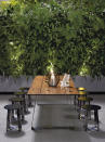 Opt for an outdoor dining table and chairs that are sturdy yet easily portable, allowing dining under the stars on clear nights or undercover when the elements settle in. A vertical garden is great for those wanting to combine privacy with smart usage of space, and is much more attractive than looking out onto a solid concrete wall.