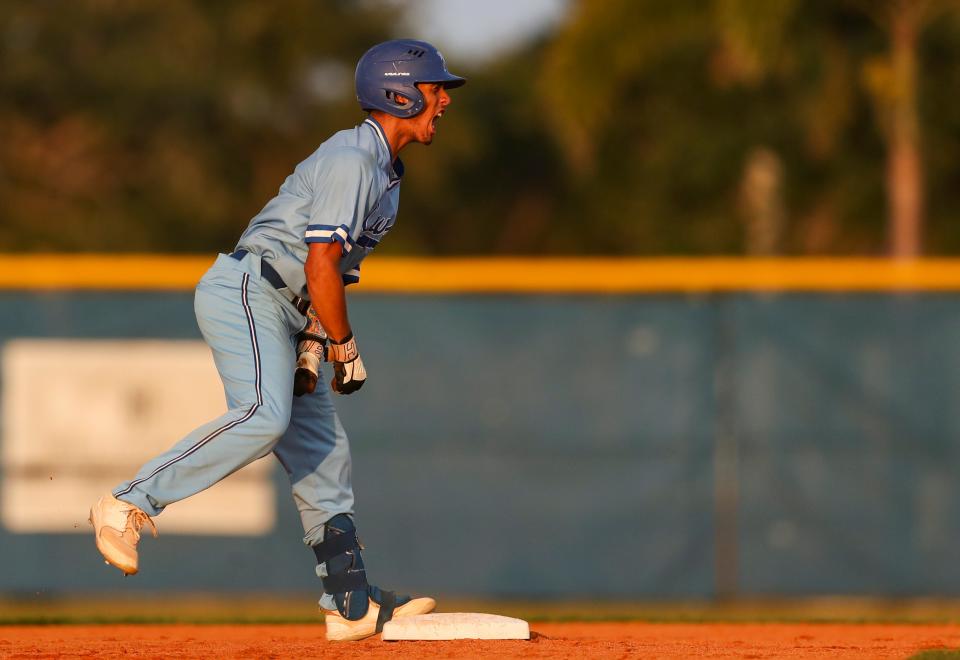 The Naples Golden Eagles compete against the Barron Collier Cougars in the Class 5A District 12 championship at Barron Collier High School in Naples on Thursday, May 2, 2024. Naples won 3-2.