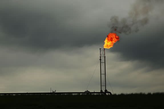 Natural gas is flared off at a plant outside of the town of Cuero, Texas.