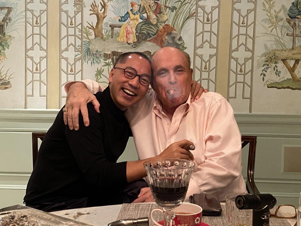 In a photo posted by an obscure Twitter account on Oct. 11, 2020, fugitive Chinese tycoon Guo Wengui and Donald Trump's personal attorney Rudy Giuliani are seen partying together, the same weekend they launched a disinformation campaign to smear Democratic presidential nominee Joe Biden. (Photo: Twitter/@billowypie)