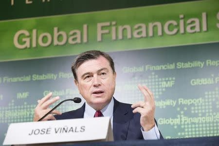 International Monetary Fund (IMF) Financial Counsellor and Director of Monetary and Capital Markets Jose Vinals answers a question during a news conference for the Global Financial Stability Report at the 2015 IMF/World Bank Annual Meetings in Lima, Peru, in this October 7, 2015 photo by IMF. REUTERS/Stephen Jaffe/IMF Staff Photo/Handout via Reuters