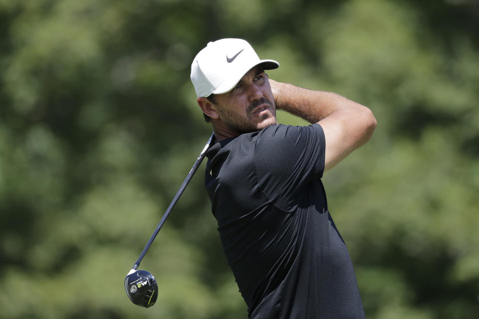 Brooks Koepka hits from the 18th tee during the third round of the Memorial golf tournament, Saturday, July 18, 2020, in Dublin, Ohio. (AP Photo/Darron Cummings)