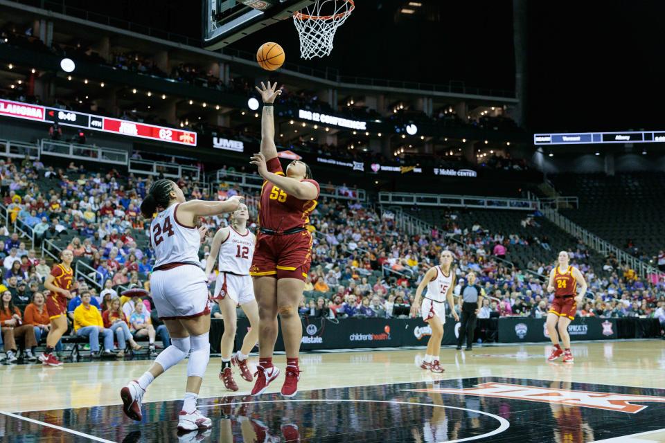 Mar 11, 2024; Kansas City, MO, USA; Iowa State Cyclones center Audi Crooks (55) shoots the ball over Oklahoma Sooners forward Skylar Vann (24) during the second half at T-Mobile Center. Mandatory Credit: William Purnell-USA TODAY Sports