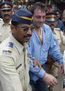 Talking about 'big kids', Sunil Dutt and Nargis' son Sanjay Dutt got arrested under TADA Act in 1993 for illegal possession of arms. He had to spent more than a year in jail after finding guilty. A file photo shows policemen escorting the actor as he comes out of TADA court in Mumbai.