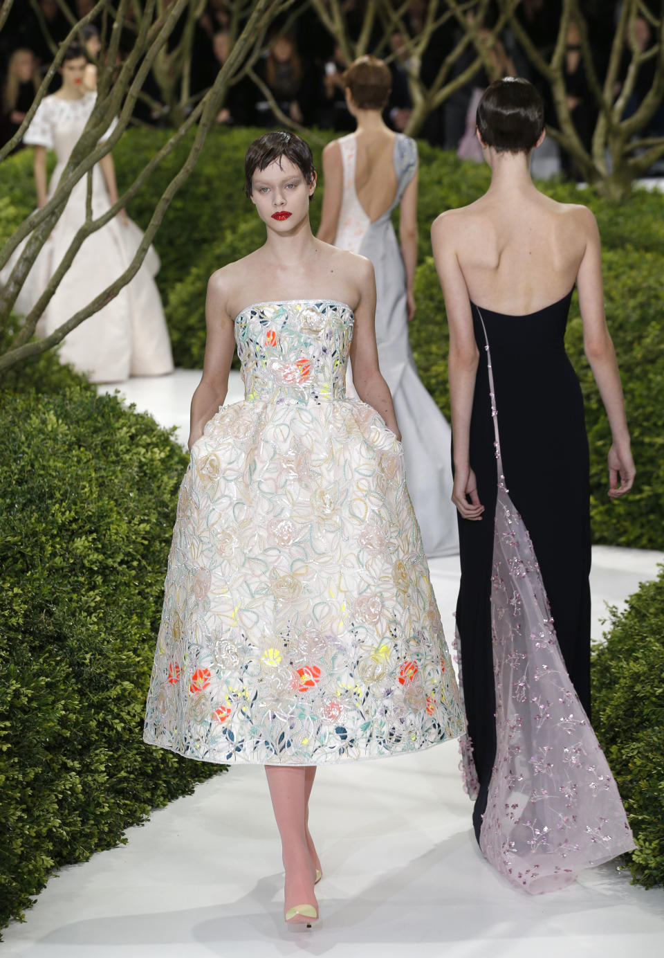 A model presents a creation by Raf Simons for Christian Dior's Spring Summer 2013 Haute Couture fashion collection, presented in Paris, Monday, Jan.21, 2013. (AP Photo/Christophe Ena)