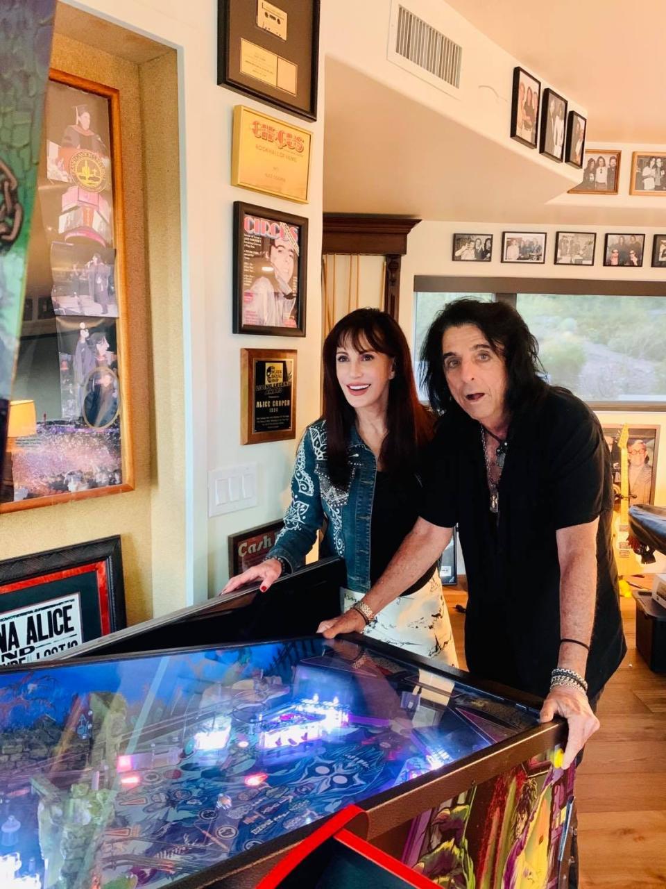 Alice Cooper is happy to be home with wife Sheryl. "I feel less vulnerable in my house than I do in a different hotel every day," he says. "You don’t know who’s been there, what they’ve touched."