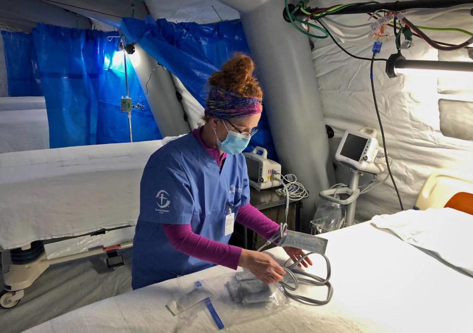 Chris Rutledge, a nurse with SamaritanÕs Purse checks medical supplies in Ward 2 of the emergency field hospital at Caldwell Memorial Hospital on Thursday, January 7, 2020. Rutledge was doing the check prior to the area becoming a COVID-19 ÒhotÓ zone. Once the area becomes a ÒhotÕ zone, all medical personnel are dressed in protective clothing with equipment to prevent them from catching the coronavirus. The field hospital is located in Lenoir, NC.