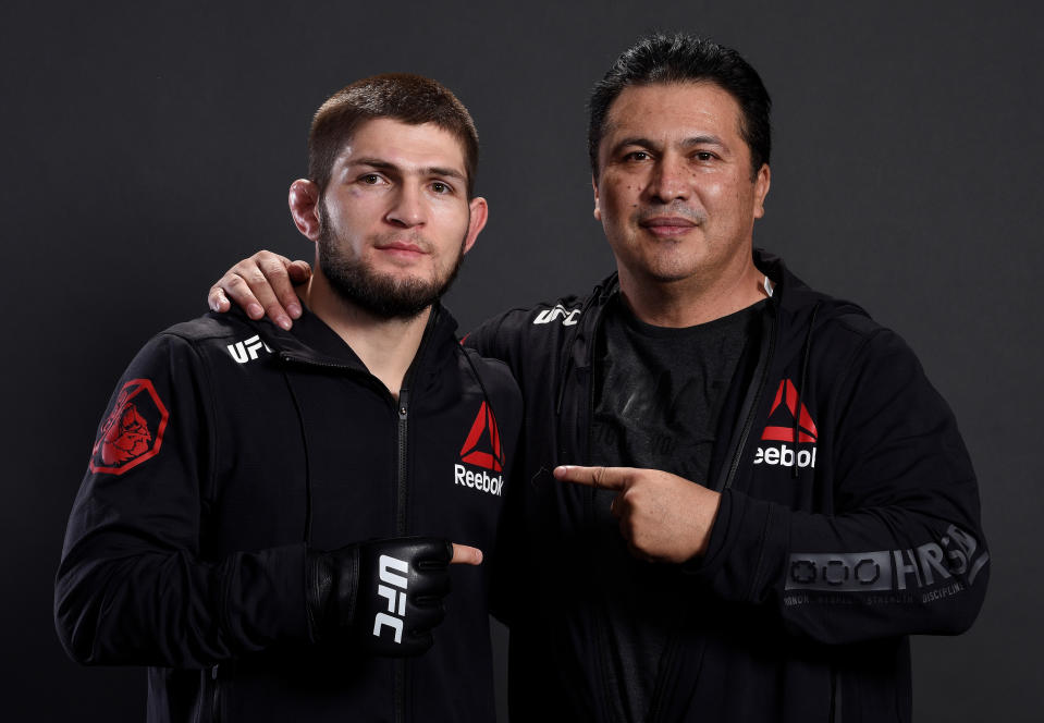 LAS VEGAS, NV - DECEMBER 30:  Khabib Nurmagomedov of Russia poses for a portrait backstage with coach Javier Mendez after his victory over Edson Barboza during the UFC 219 event inside T-Mobile Arena on December 30, 2017 in Las Vegas, Nevada. (Photo by Mike Roach/Zuffa LLC/Zuffa LLC via Getty Images)