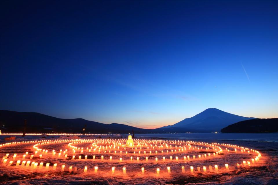 Mount Fuji behind a circle of snow candles