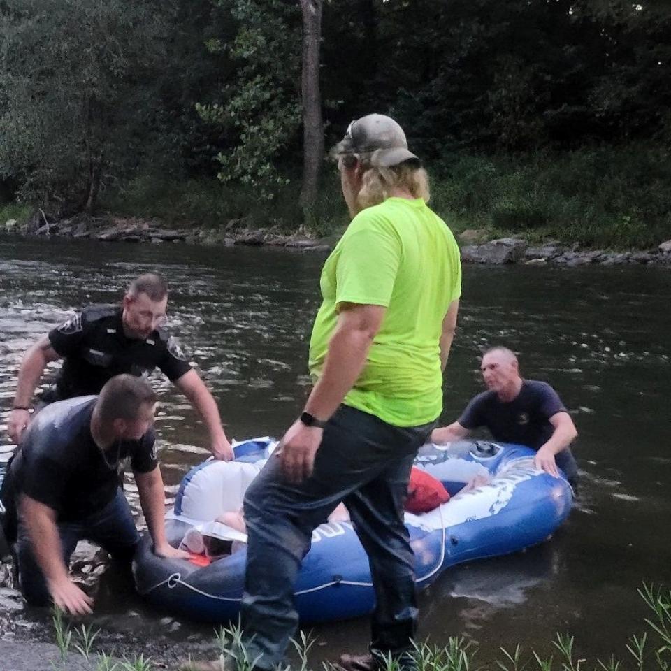 A young woman, whose her car plunged off a cliff in West Virginia, was placed in an inflatable raft and floated down river to an accessible hoisting point to be flown to R Adams Cowley Shock Trauma Center in Baltimore for treatment.