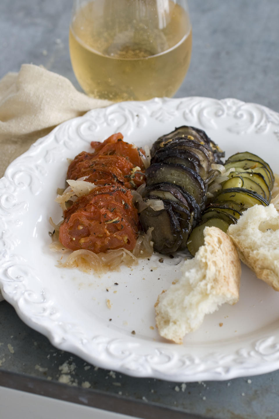 In this image taken on April 15, 2013, ratatouille tian is shown served on a plate in Concord, N.H. (AP Photo/Matthew Mead)