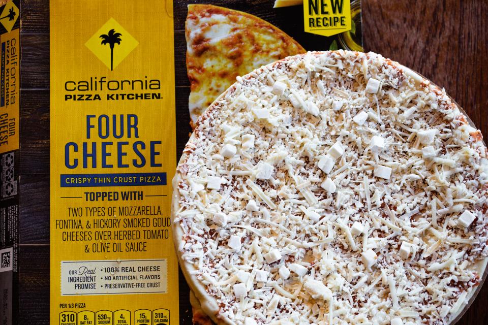 California Pizza Kitchen pizza with box