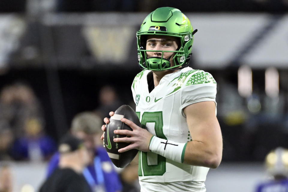 Bo Nix and the Oregon Ducks will be heavily favored against Liberty. (AP Photo/David Becker)