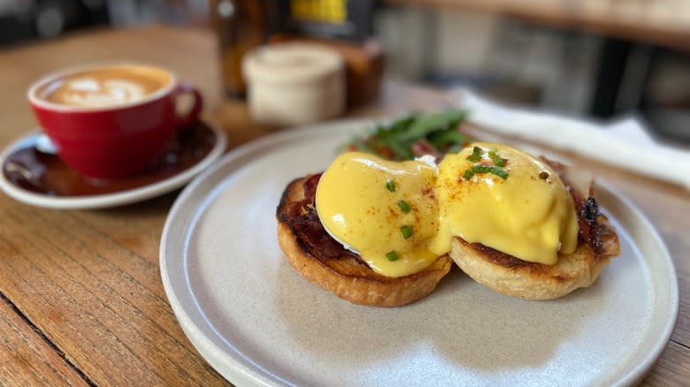 Eggs Benedict on white plate