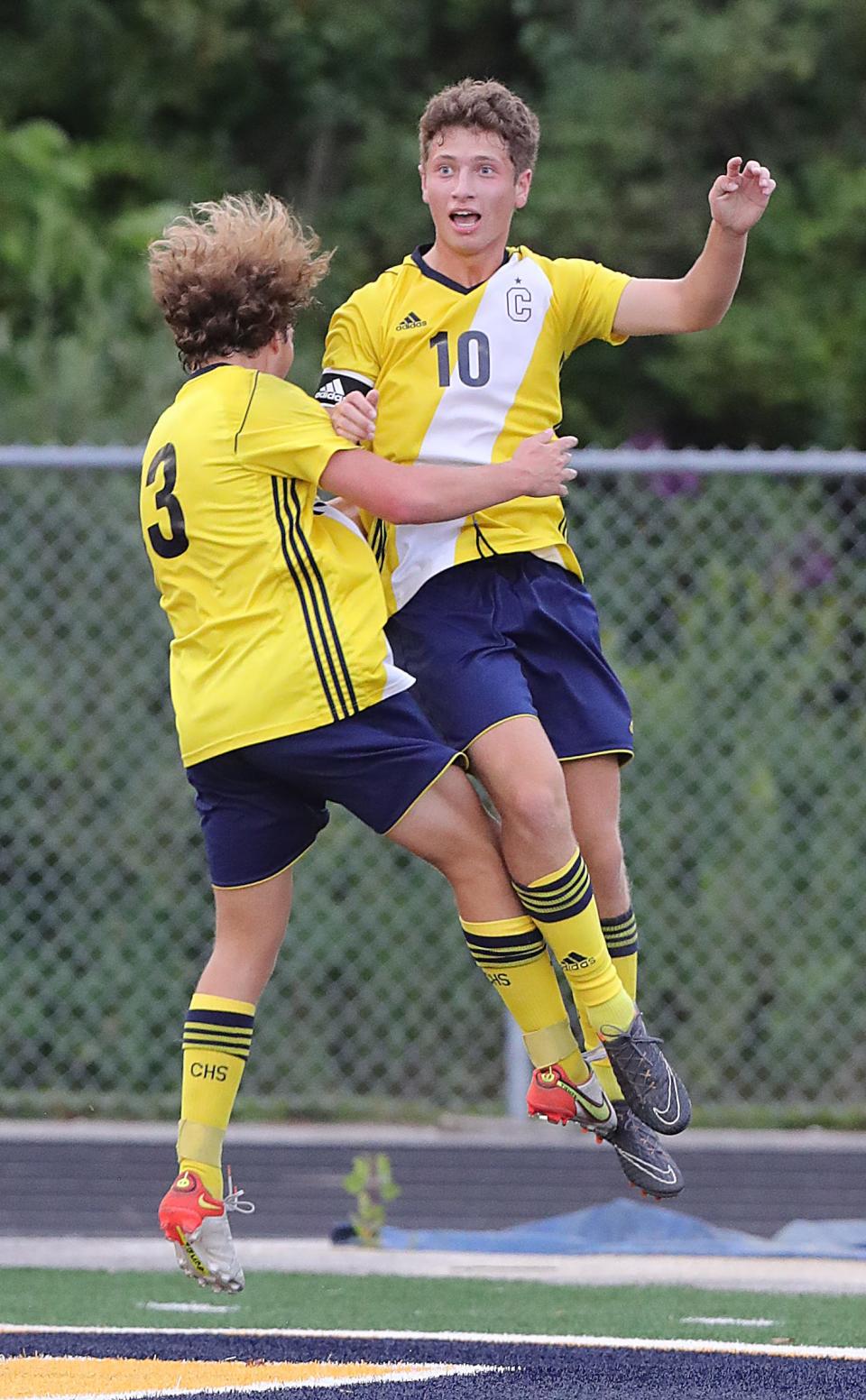 Copley's Colin Link celebrates a first half goal against North Royalton with Calvin Cunat, left, on Thursday, Aug. 25, 2022 in Copley.