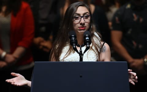 Caitlyn Caruso, a survivor of sexual assault, speaks before U.S. Vice President Joe Biden as part of the national It's On Us Week of Action  - Credit: Ethan Miller/Getty Images