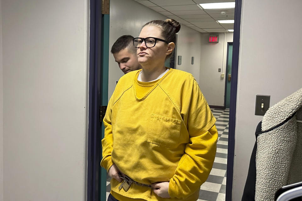 Lisa Snyder is led into Berks County Court in Reading, Pa., on Friday, Nov. 17, 2023. A judge on Friday rejected a plea agreement for Snyder, who sought to plead no contest but mentally ill to two counts of third-degree murder in the September 2019 deaths of her two young children.(AP Photo/Michael Rubinkam)