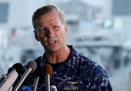 FILE PHOTO: Vice Admiral Joseph Aucoin, U.S. 7th Fleet Commander, speaks to media on the status of the U.S. Navy destroyer USS Fitzgerald, damaged by colliding with a Philippine-flagged merchant vessel, and the seven missing Fitzgerald crew members, at the U.S. naval base in Yokosuka, south of Tokyo, Japan June 18, 2017. REUTERS/Toru Hanai/File photo