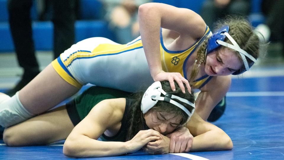 Buena's Shea Aretz controls Mainland's Jackeline Ramos Oviedo during the 126 lb. final bout of the South Region girls wrestling tournament held at Williamstown High School on Sunday, February 19, 2023.  Aretz defeated Ramos Oviedo, 8-2.