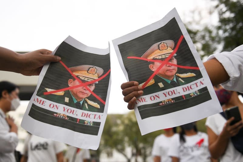 Myanmar citizens protest against the military coup in Myanmar outside United Nations venue, in Bangkok