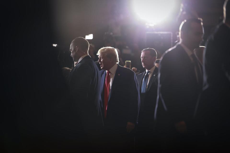 Former President Donald Trump greets supporters at Mar-a-Lago on April 4, 2023, hours after he pleaded not guilty to 34 felony counts. <a href="https://media.gettyimages.com/id/1479878029/photo/former-president-donald-trump-holds-a-press-conference-at-mar-a-lago-after-being-arraigned-in.jpg?s=612x612&w=gi&k=20&c=NiFI-WSiQsV--UL9nduLo2LM-9tra_4fWirN-4_2m7g=" rel="nofollow noopener" target="_blank" data-ylk="slk:Joe Raedle/Getty Images;elm:context_link;itc:0;sec:content-canvas" class="link ">Joe Raedle/Getty Images</a>