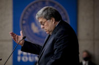 U.S. Attorney General William P. Barr speaks at the Gerald R. Ford Presidential Museum in Grand Rapids, Mich., Thursday, July 16, 2020. The United States has become overly reliant on Chinese goods and services, including face masks, medical gowns and other protective equipment designed to curb the spread of the coronavirus, Attorney General Barr said Thursday. (Nicole Hester/Mlive.com/Ann Arbor News via AP)