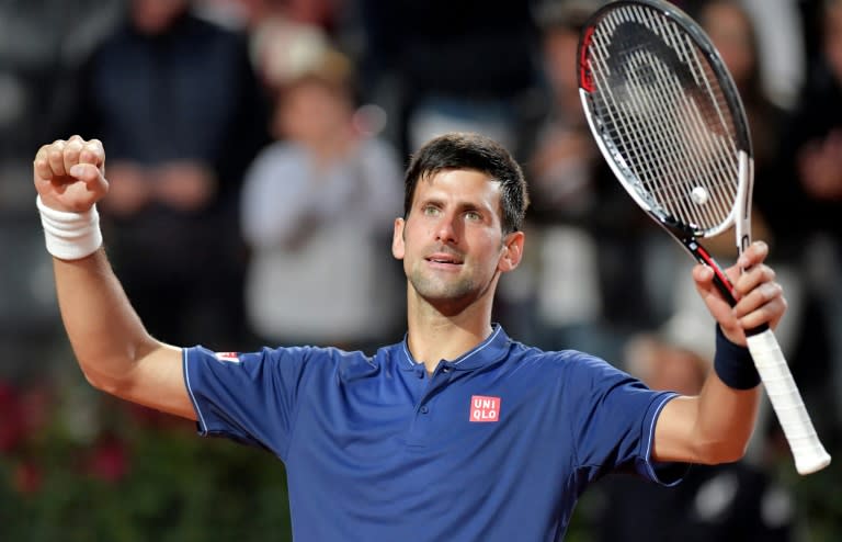 Novak Djokovic of Serbia celebrates after winning the semi-final match against Dominic Thiem of Austria at the ATP Tennis Open tournament, on May 20, 2017 at the Foro Italico in Rome