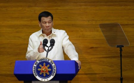 FILE PHOTO: Philippine President Rodrigo Duterte delivers his State of the Nation address at the House of Representatives in Quezon city, Metro Manila, Philippines July 23, 2018. REUTERS/Czar Dancel