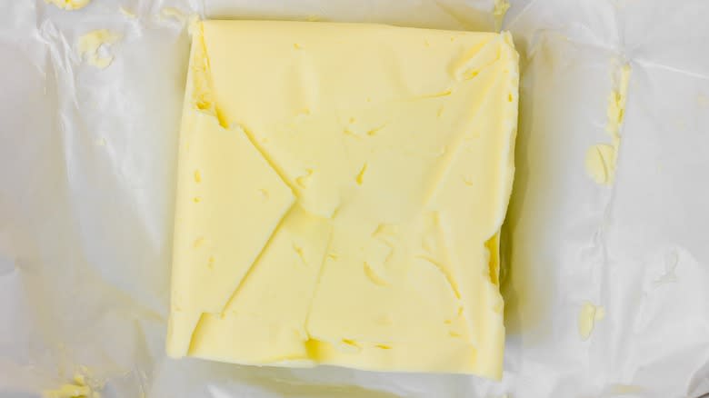 block of butter in its wrapper