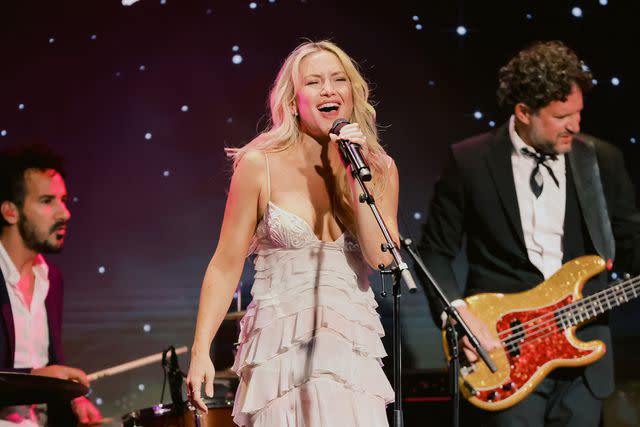 <p>Kevin Winter/Getty </p> Kate Hudson performs onstage during the GLAAD Media Awards at The Beverly Hilton in March 2024 in Beverly Hills