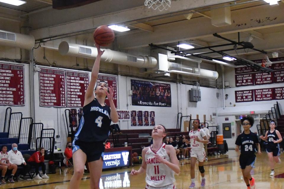 Highland's Breelynn Leary goes to the rim in front of Rancocas Valley freshman Jordan Reynolds during championship weekend of the South Jersey Invitational Tournament at Eastern High School in this photo from 2022.