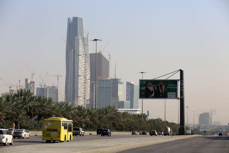 Cars drive past the King Abdullah Financial District in Riyadh, Saudi Arabia December 18, 2018. REUTERS/Faisal Al Nasser