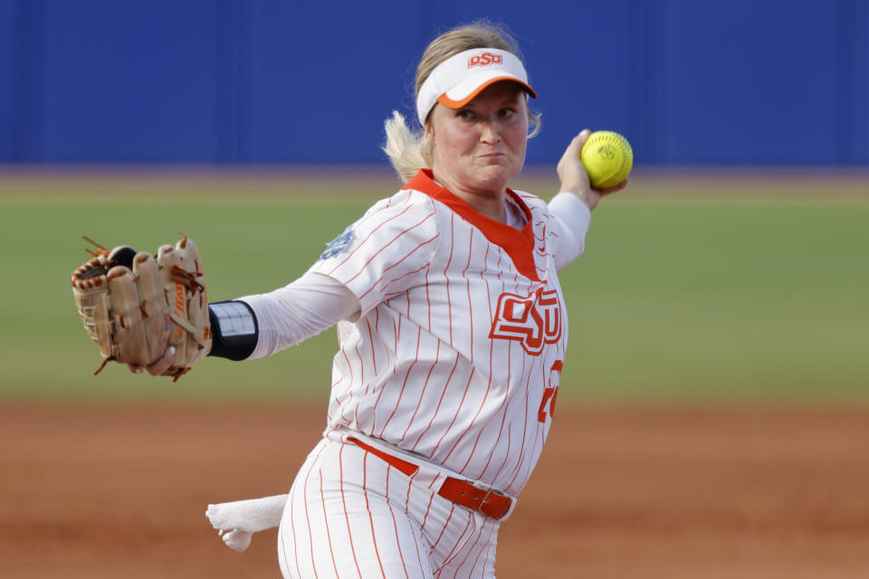 Oklahoma State's Kelly Maxwell pitches against Tennessee during the first inning of an NCAA softball Women's College World Series game Sunday, June 4, 2023, in Oklahoma City. (AP Photo/Nate Billings)