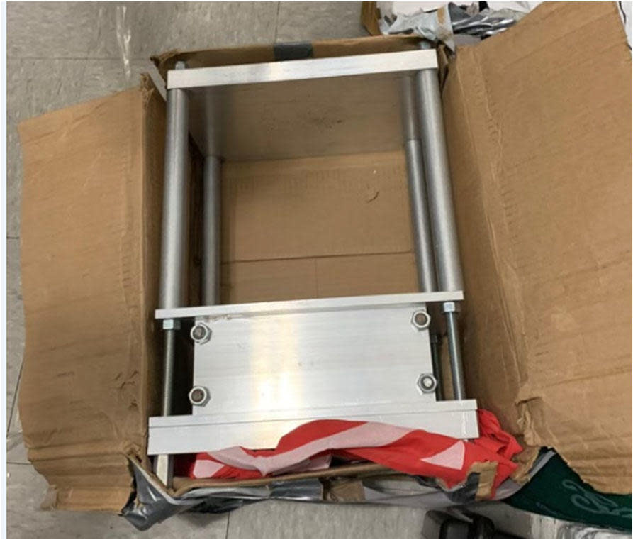 Authorities said this is a kilo press device found at Divino Nino day care in the Bronx, where toddler Nicholas Dominici died.  / Credit: U.S Attorney's Office