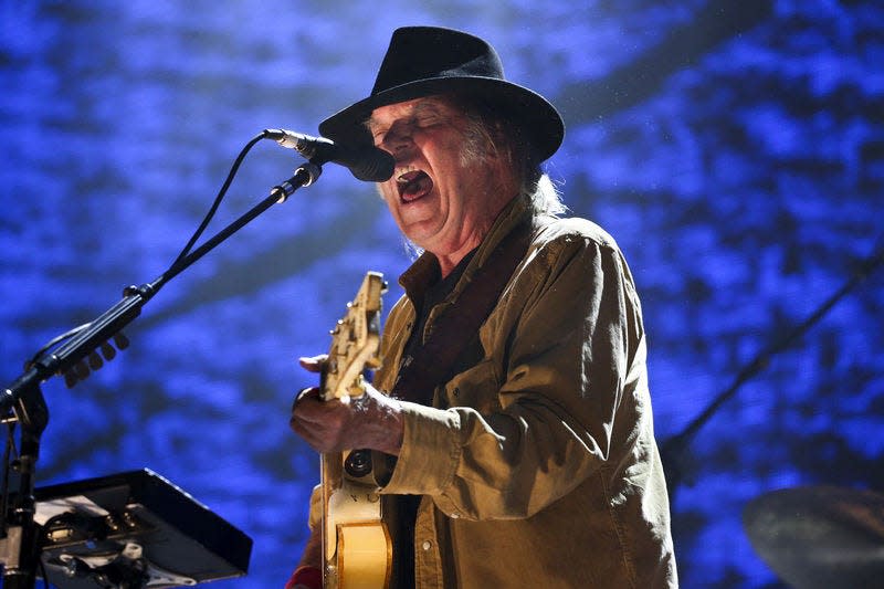 Neil Young performs during Farm Aid 30 at the FirstMerit Bank Pavilion on Northerly Island on Saturday in Chicago. Young delivered a politically charged set that focused on the hegemony of Big Agriculture.TNS Photo/Chicago Tribune, ARMANDO L. SANCHEZ