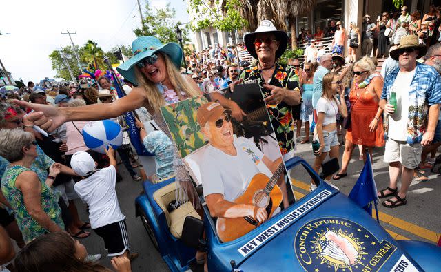 <p>ROB O'NEAL/Florida Keys News Bureau/AFP via Getty</p> Jimmy Buffett parade in Key West