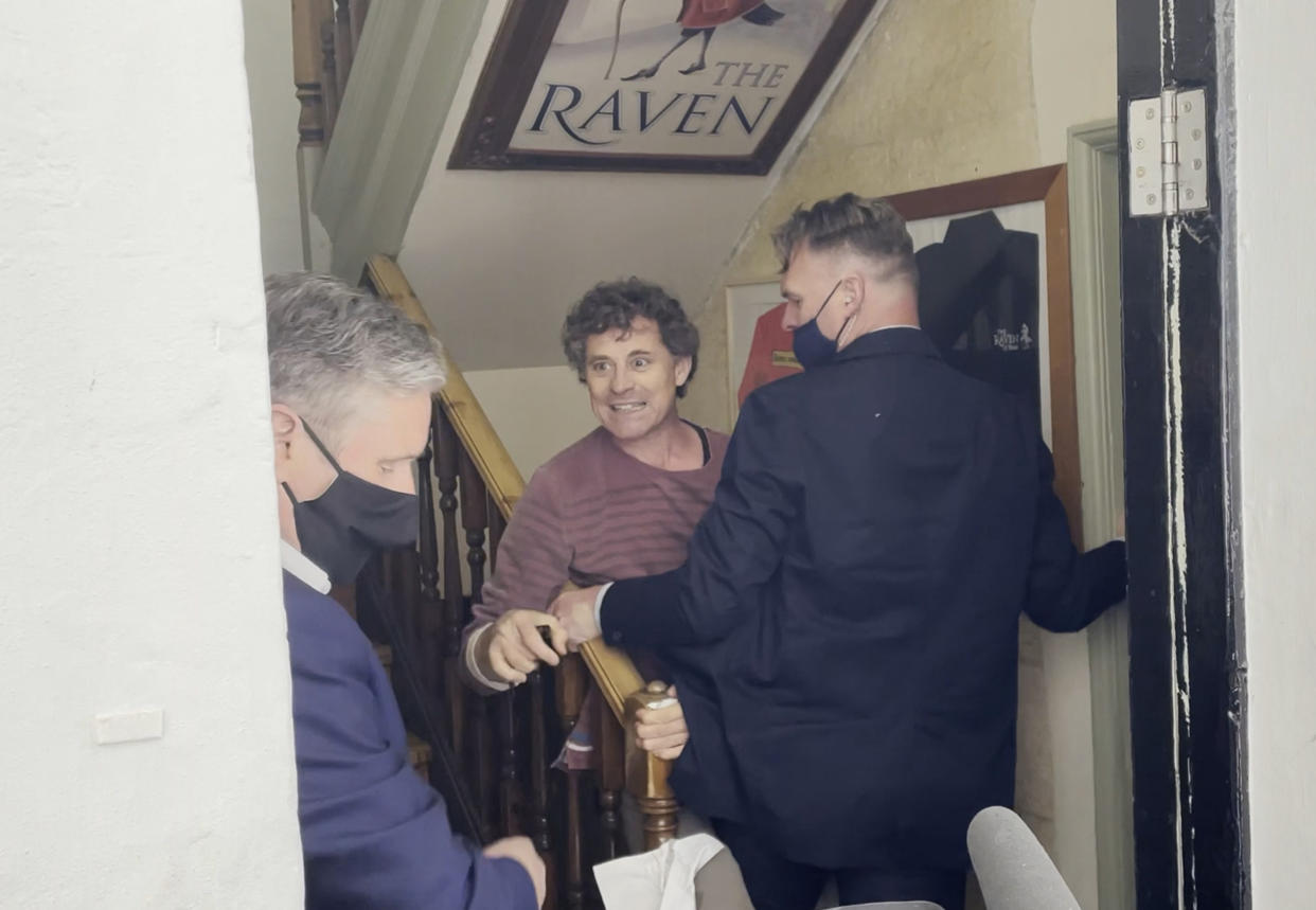 Screengrab taken from PA video of Rod Humphris (centre) landlord of the Raven pub grapples with a member of Keir Starmer's team after refusing entry to the Labour leader (left) during his visit to Bath. Mr Starmer was visiting the city to support West of England metro mayoral candidate Dan Norris and mark Labour's launch of an independent Commission to rebuild Britain's high streets. Picture date: Monday April 19, 2021.