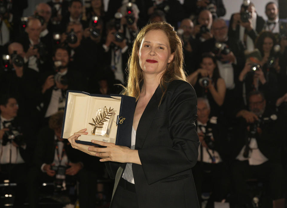 Justine Triet, winner of the Palme d'Or for 'Anatomy of a Fall,' poses for photographers during a photo call following the awards ceremony at the 76th international film festival, Cannes, southern France, Saturday, May 27, 2023. (AP Photo/Daniel Cole)