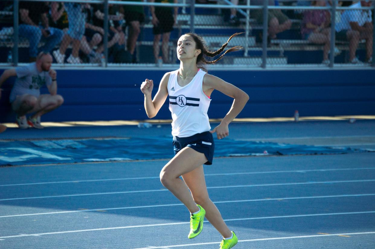 Hillsdale senior Angela Alvarez runs to a regional championship in the 400-meter dash.
