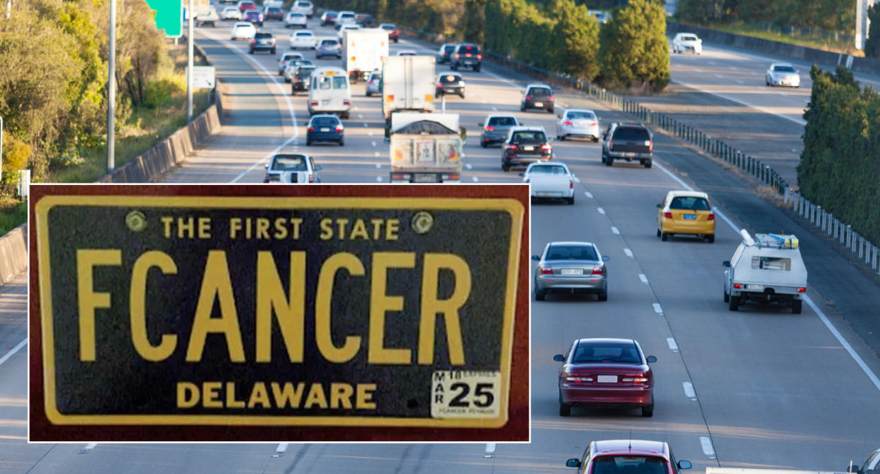 The number plate which reads 'FCANCER' set against a backdrop of an Australian highway.
