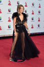 <p>Thalía estuvo majestuosa en los Latin Grammy por cuenta de este revelador vestido negro, en encaje. Getty Images </p>