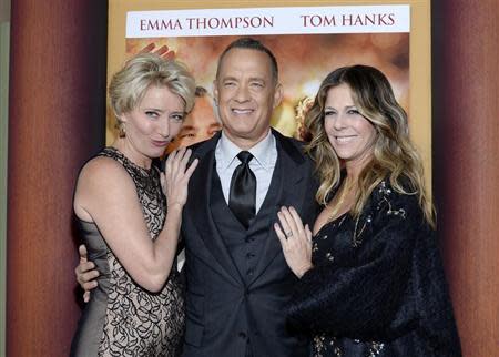 Cast members Emma Thompson (L), Tom Hanks and his wife Rita Wilson (R) attend the film premiere of "Saving Mr. Banks," at the Walt Disney Studios in Burbank, California, December 9, 2013. REUTERS/Kevork Djansezian
