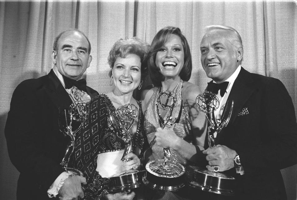 <p>The stars of<em> The Mary Tyler Moore Show</em> are all smiles as they celebrate their Emmy victory. The show ran for seven seasons and won a whopping 29 Emmys.</p>