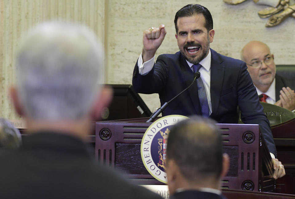 Puerto Rico's Gov. Ricardo Rossello delivers his commonwealth address at the seaside Capitol, in San Juan, Puerto Rico, Wednesday, April 24, 2019. Rossello pledged on Wednesday to lift the U.S. territory from a deep recession by creating more jobs, reversing a migration exodus and implementing a range of incentives as the island struggles to recover from Hurricane Maria. (AP Photo/Carlos Giusti)