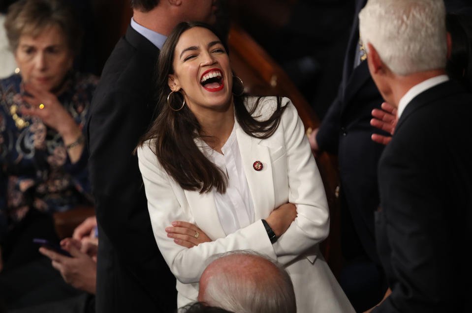 Rep. Alexandria Ocasio-Cortez wore a white suit for her swearing-in. (Photo: Getty Images)